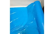 folia stretch niebieska Harmadon Thincore 500 mm rozwinięta z rolki o wysokiej elastyczności i wytrzymałości do pakowania i zabezpieczania towarów